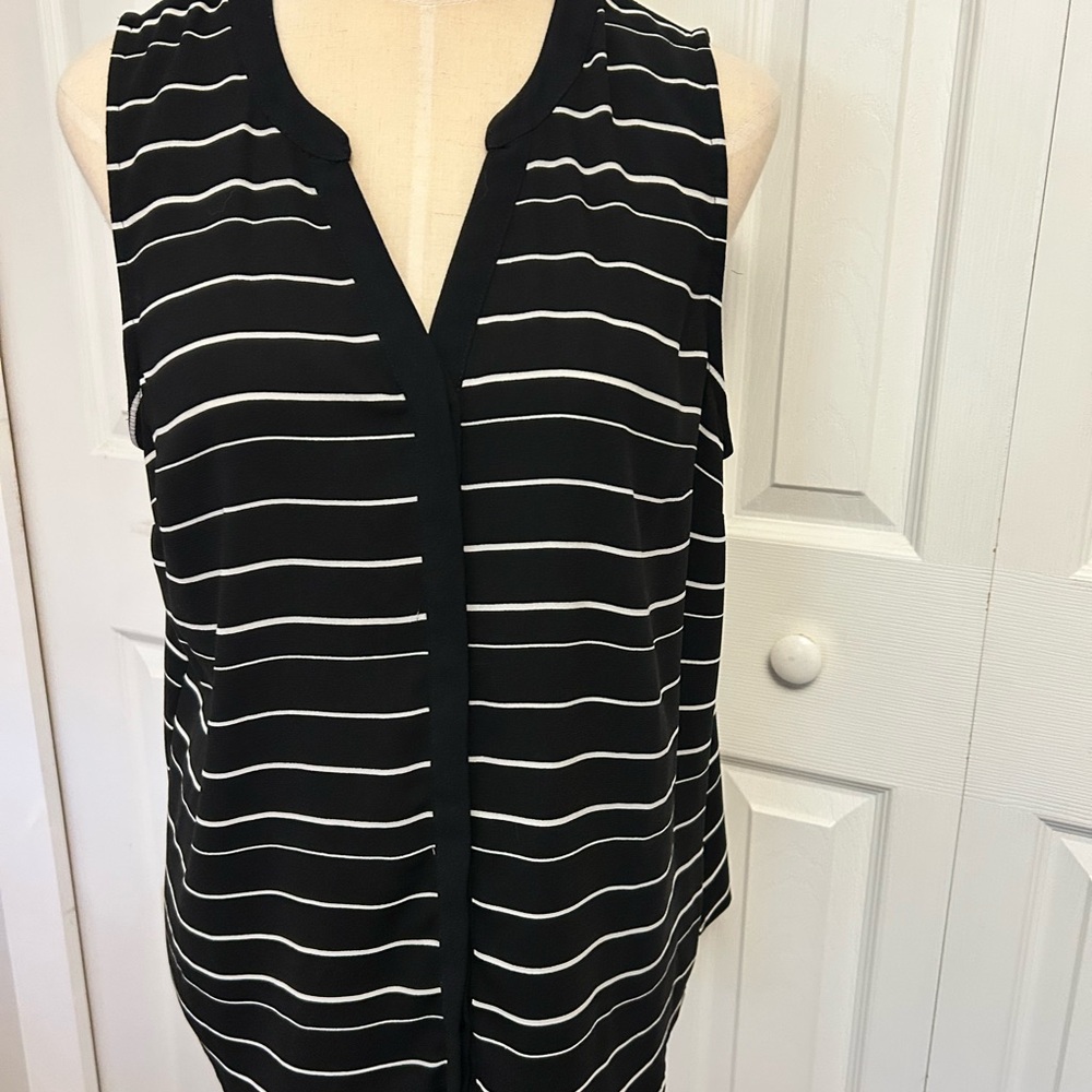 Elegant Black and White Striped Sleeveless Blouse